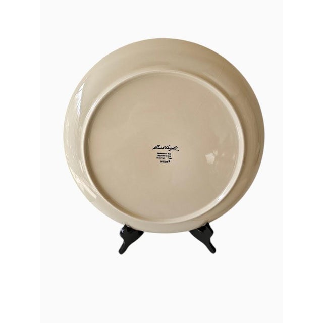 Set of three Russel Wright Oneida stoneware 9-3/8" diameter salad plates in linen white. These were purchased new by...