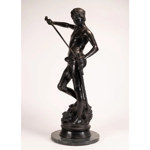 Overview An exceptional and rare 19th-century bronze sculpture titled “David Le Vainqueur” (“David the Victor”) by...