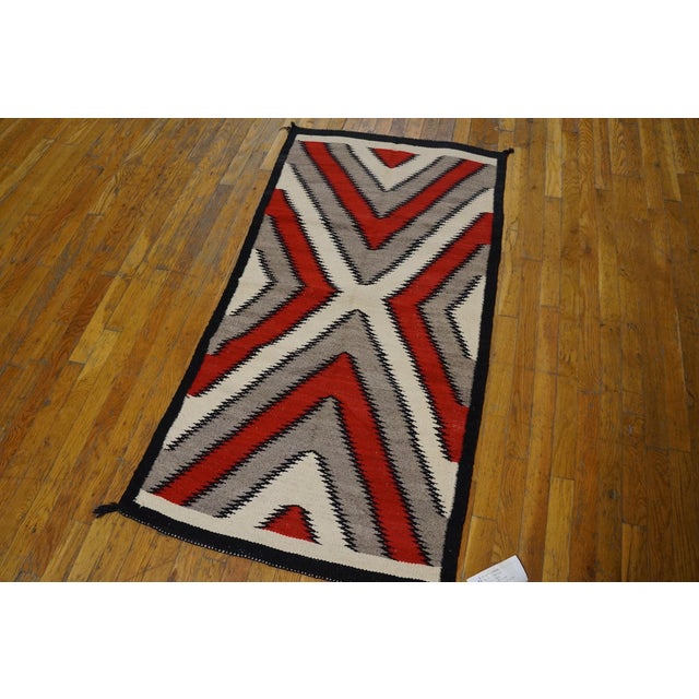 1930s American Navajo Rug ( 2'8" x 5' - 81 x 152 ) A bold pattern of four nested chevroned triangles in natural light...