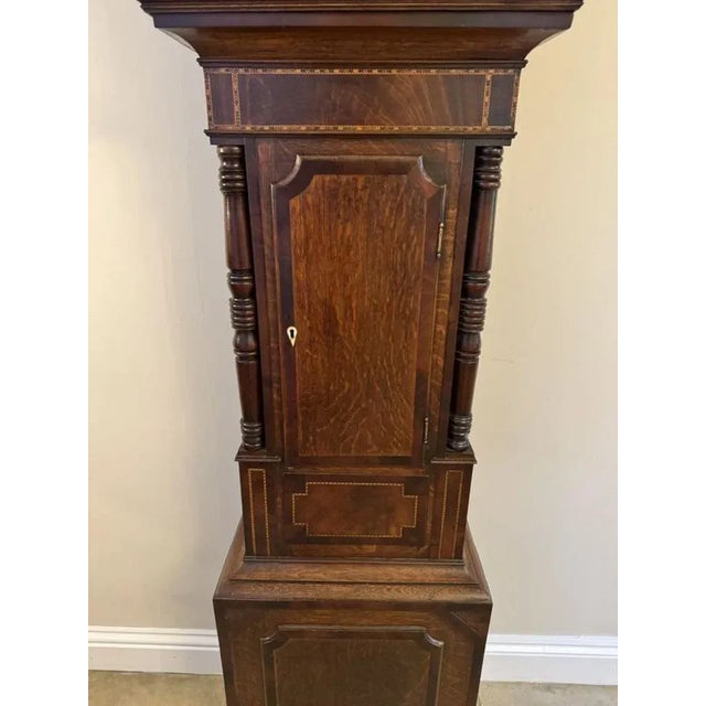 Fantastic quality antique George III mahogany and oak longcase clock with a painted dial decorated with castles, country...