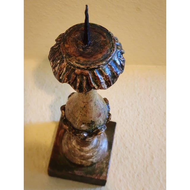 It is possible that this candlestick holder is in fact from the 18th Century or beyond but it is at least as old as the...