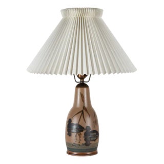 Danish Art Deco Table Lamp in Ceramic with Swimming Ducks + Le Klint Shade by L. Hjorth, 1940s For Sale
