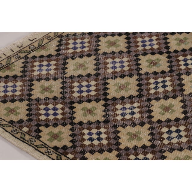 Made with hand-knotted wool and originating circa 1950-1960, this 5x7 vintage rug is an exciting new piece in Rug &...