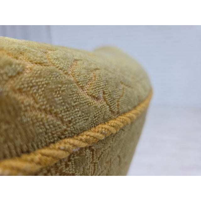 1960s, Danish armchair. Original green furniture cotton/wool fabric, solid oak wood, springs in the seat. Manufactured by...