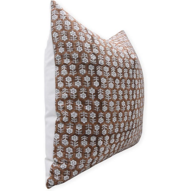 Elevate your living space with this block print handmade cushion cover, crafted from thick white cotton for durability and...