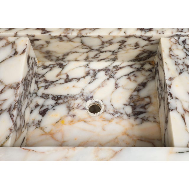 Handmade Calacatta Viola marble vanity with storage drawers and rectangular integrated sink. All natural marble with wood...
