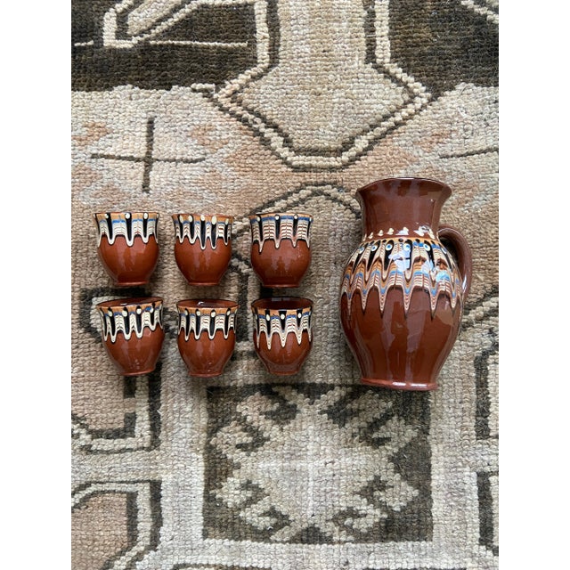 Gorgeous set of Boho red clay Troyan pottery handmade in Bulgaria. Beautiful slip glaze marble detail. Perfect for coffee,...