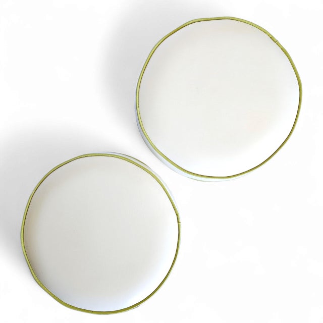 Make a bold design statement with this pair of vintage Mid-Century Modern faux bamboo stools. Crafted with the glamorous...