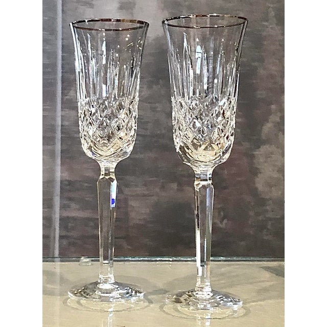 This is for a pair of Waterford Crystal Champagne Flutes. These are in the Kelsey Platinum pattern that measure: 8 3/4...