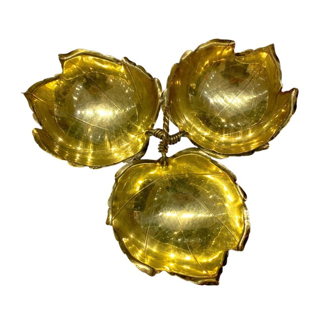 An exceptional mid-century brass triple-leaf serving dish by renowned Italian-American metal artist Alfredo Sciarrotta,...