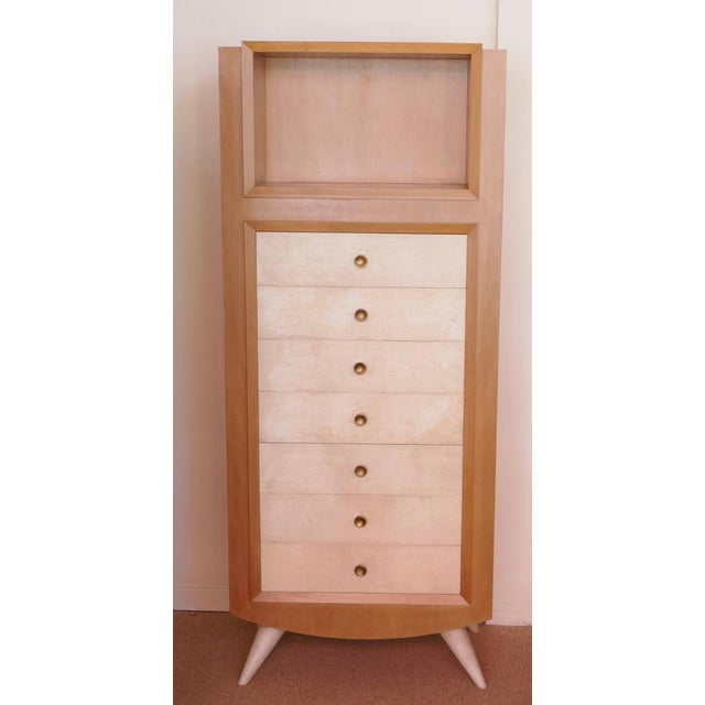 Blanche klotz (attributed to) ash chest of drawers, tapered legs mounted at an angle and covered in parchment, 7 drawers...