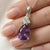 This stunning pendant features a deep, regal Amethyst, a gemstone long admired for its rich violet tones and timeless...