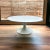Here is a vintage mid—century tulip 36”coffee table Designed by Eero Saarinen for Knoll. This collectible table with...