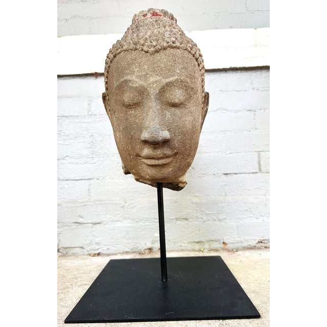 Antique Thai Ayutthaya Style Sandstone Head of Buddha on Metal Stand. Probably 18th–19th Century (estimated). An...