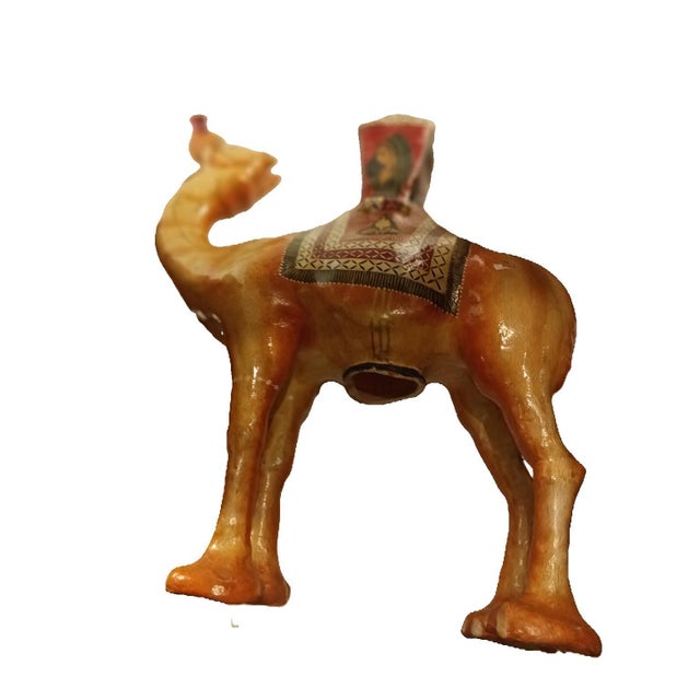 An extraordinary and highly collectible mid-century Middle Eastern sculptural table lamp crafted in the form of a majestic...