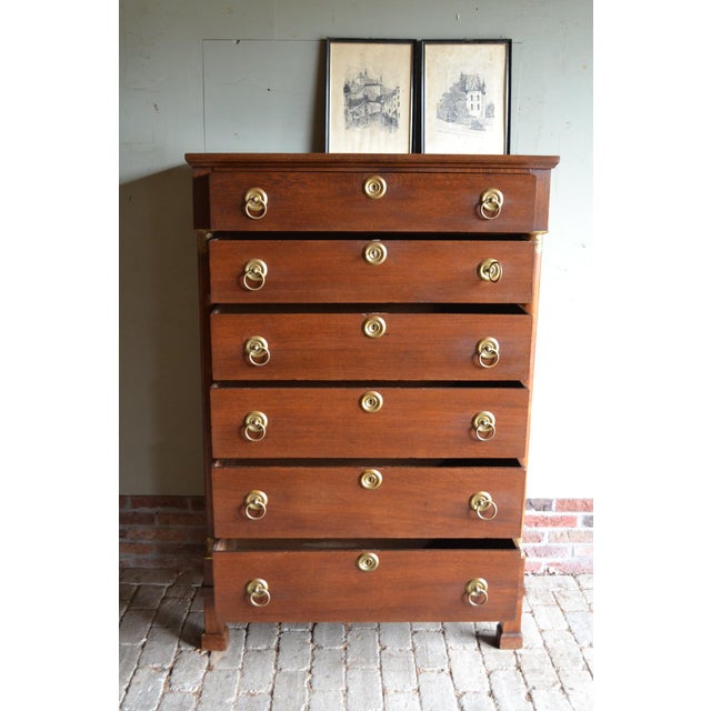 19th-century Dutch oak Empire chiffonier, chest of drawers. The height is 151 cm. The width is 102 cm. The depth is 49 cm....