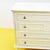 This refined vintage-style chest of drawers features a simple yet sophisticated design, perfect for enhancing any home...