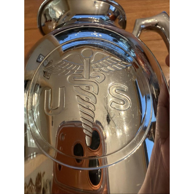 Offered here is an early 20th-century Stanley vacuum-insulated pitcher manufactured by Landers, Frary & Clark of New...