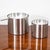 Pair of revolving stainless steel ashtrays designed by Arne Jacobsen for Stelton. Stamped beneath. Measurements: Large...
