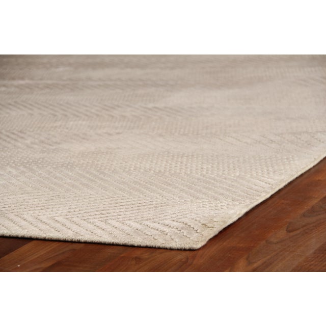 Luxurious Art Silk and a soft color palette come together in subtle, but stunning herringbone pattern to create our...