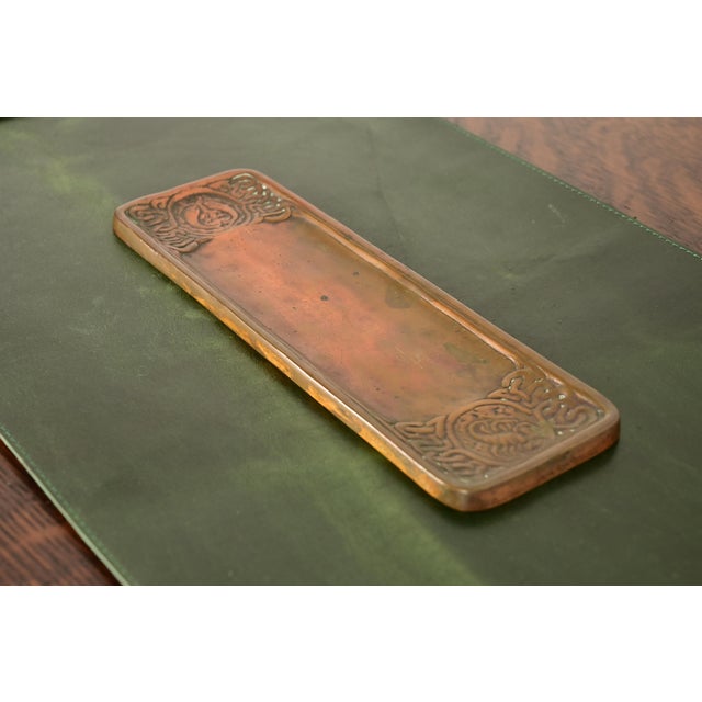 A gorgeous antique Art Deco or Arts & Crafts bronze pen tray or desk tray featuring Zodiac designs By Tiffany Studios...