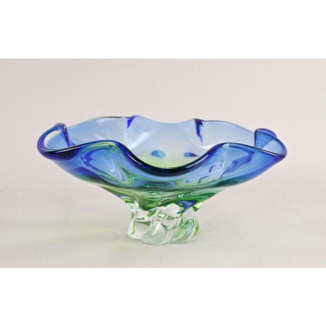 Amazing looking mid century blue Murano glass bowl or centerpiece coming from the world famous workshops in Venetia/ Italy...