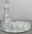 An elegant Vintage crystal cut carafe set , featuring a decorative cut design and supplied with 6 shot glasses, a tray and...