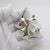 This vintage silver animal sculpture depicts life size tropical fishes, crafted as a desktop accent, vitrine display, or...