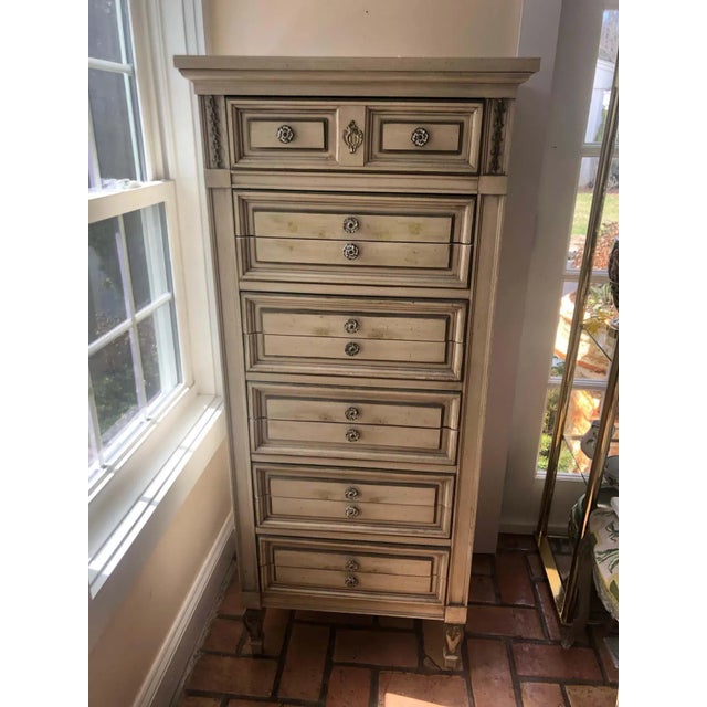 Hollywood Regency upright jewelry dresser. This vintage piece made by Dixie has been custom fitted for jewelry. The...