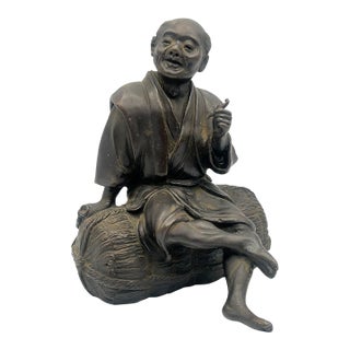 Japanese Meiji Bronze Okimono Seated Pipe Smoker, Signed Toko, C. 1890 For Sale