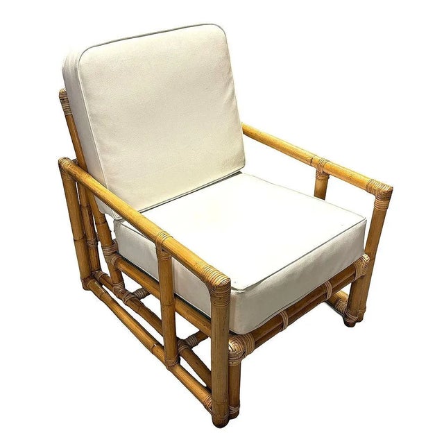 These Restored Rattan Lounge Chairs with Modern Cubist Arms fashion after classic East Asian designs much like the designs...