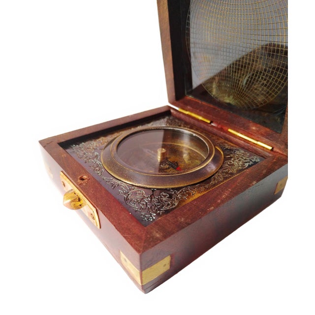 This Black Finish Brass Compass in Wooden box will be great accent as it is functional as well as décor option. The...