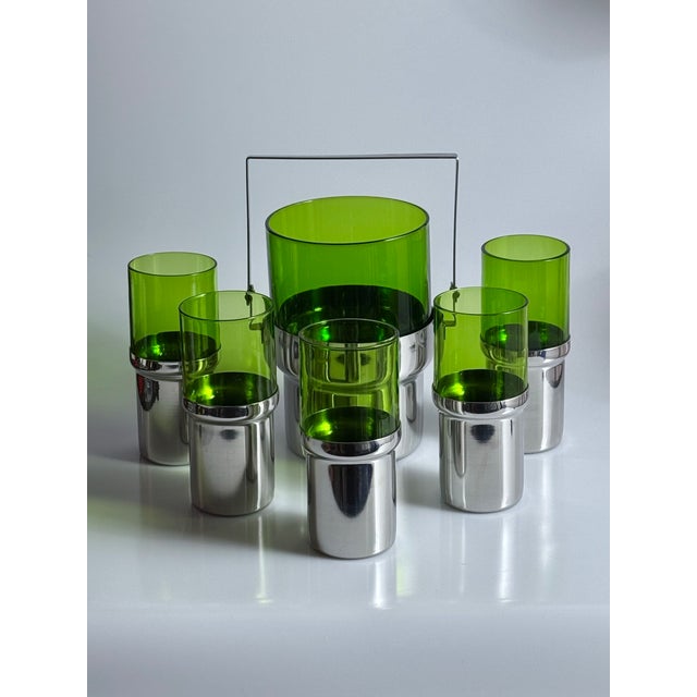 Bar set consisting of an ice bucket and five glasses made of green glass and highly polished stainless steel, Pran, Italy,...