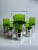 Bar set consisting of an ice bucket and five glasses made of green glass and highly polished stainless steel, Pran, Italy,...