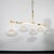 White Modern linear chandelier with Murano glass shades For Sale - Image 8 of 15