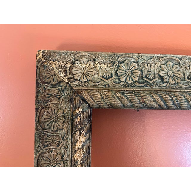 This antique Victorian ornate gesso wood picture frame with a floral motif is a beautiful and unique decorative...