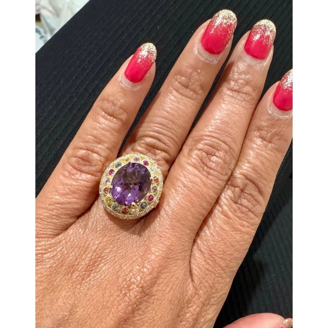 5.62 Carat Natural Amethyst Diamond Sapphire Yellow Gold Cocktail Ring This ring has a bright and vivid purple Oval Cut...