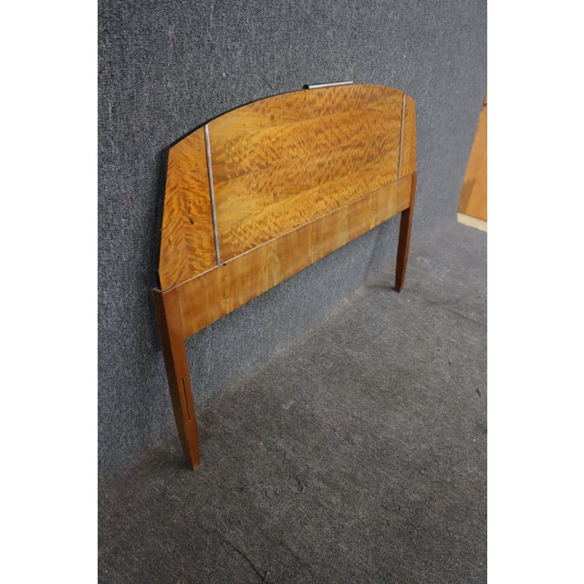 Birchwood mid century headboard with metal details.