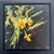 Daffodils by Sandra Pratt | Oil Painting of yellow daffodil flowers on a dark background For Sale