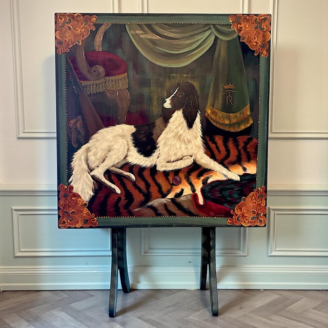 A striking late 20th century hand-painted folding occasional table, executed in the English country house style...