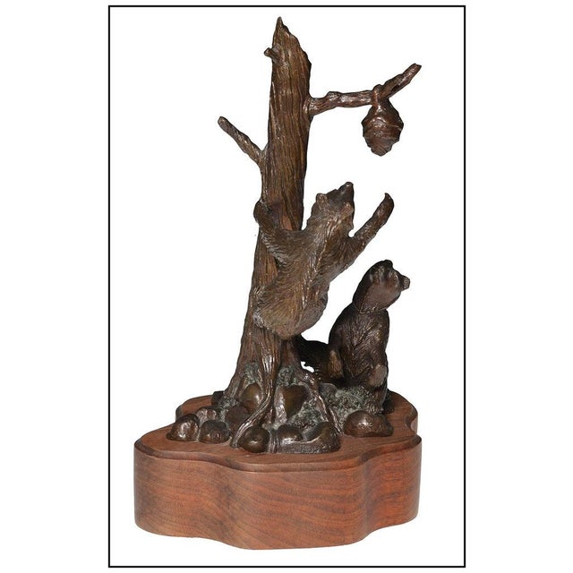 The artwork here, "Trouble Brewing", is a wonderful depiction of two bears climbing a tree to get to a bee hive, that was...