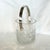 Vintage 1970s Hollywood Regency style crystal and silver-plated ice bucket. Heavy molded crystal body features a light-...