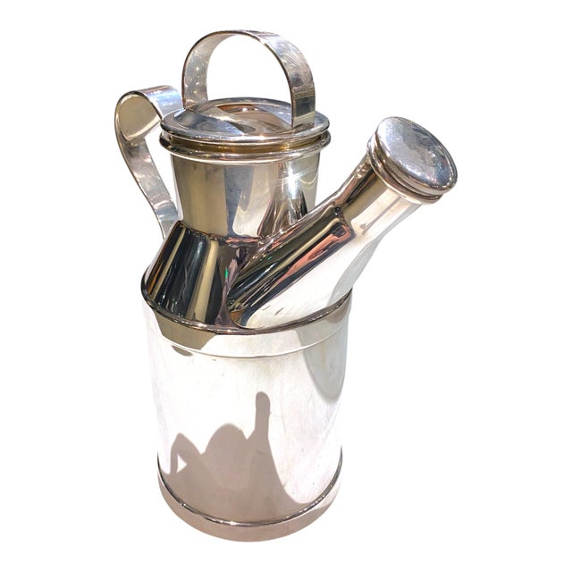 A beautiful mid-century cocktail shaker from Reed & Barton in the form of a milk can. Circa 1950's. These were produced in...