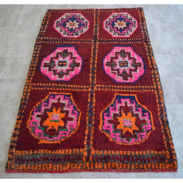 This vintage Kurdish rug from Kars in Turkey measures 46" x 75".. It features wool on wool with natural dyes. The rug is...