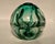 A striking early studio‑glass work by Paul Manning, signed and dated 1974. This hand‑blown green glass sculpture features...