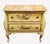 A lovely Italian hand painted commode. Faux marble painted top with yellow body. Chinoiserie painted design to body. Two...