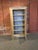 Bring soulful, global character to your space with this stunning rustic wooden armoire. Crafted with a beautiful...