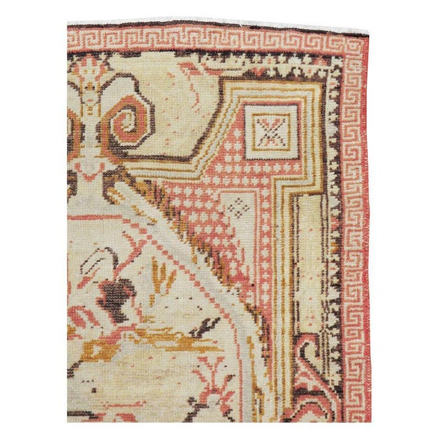 A vintage Turkish Ghiordes throw rug handmade during the mid-20th century. Measures: 3' 7" x 5' 3".