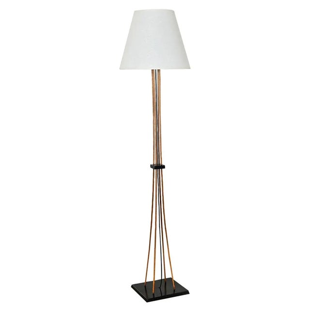 A stylish Mid-Century Modern floor lamp with new, custom white linen shade. This slender fixture has a minimalist,...