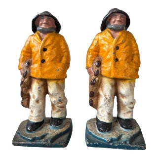 Pair of Vintage Cast Iron Bookend Fishermen Yellow Slickers - Or Doorstops For Sale